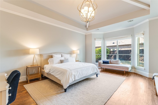 924 Winding Ridge Trl, Southlake, TX 76092 - bedroom with crown molding, visible vents, baseboards, wood finished floors, and a notable chandelier
