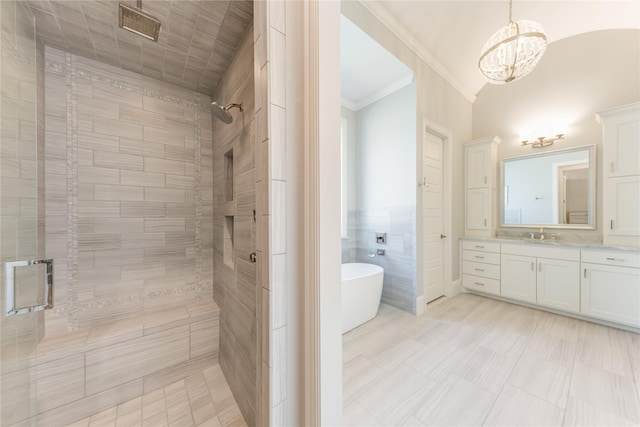 924 Winding Ridge Trl, Southlake, TX 76092 - full bathroom with a soaking tub, crown molding, a stall shower, vanity, and a notable chandelier