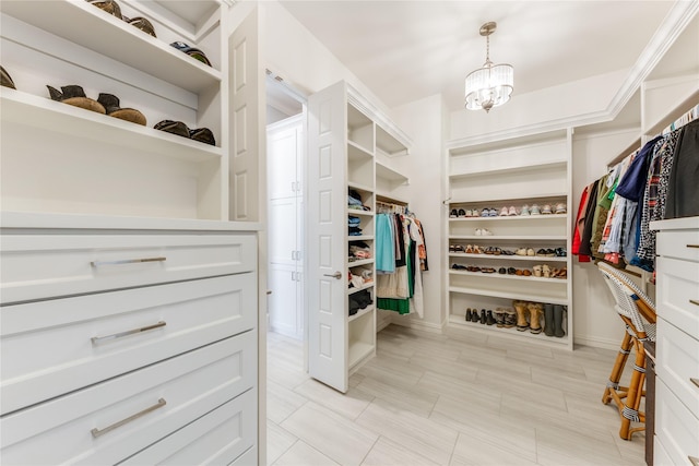 924 Winding Ridge Trl, Southlake, TX 76092 - spacious closet with an inviting chandelier