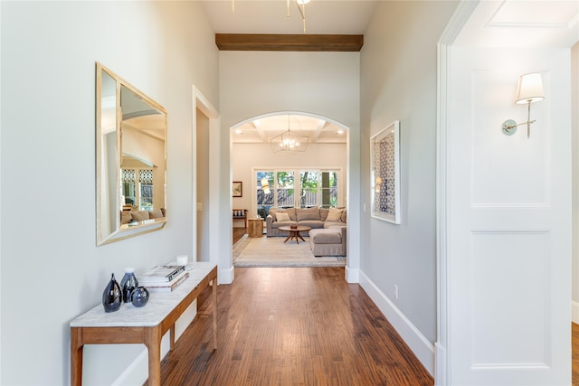 924 Winding Ridge Trl, Southlake, TX 76092 - hallway featuring arched walkways, wood finished floors, and baseboards