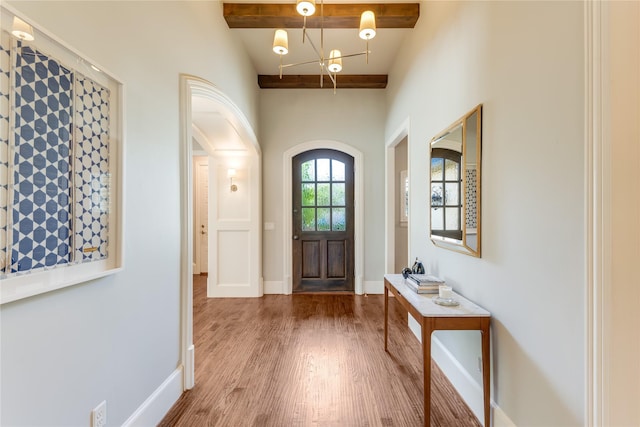 924 Winding Ridge Trl, Southlake, TX 76092 - doorway to outside featuring baseboards, wood finished floors, and arched walkways