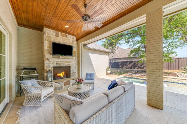 924 Winding Ridge Trl, Southlake, TX 76092 - view of patio with a fenced in pool, a ceiling fan, an outdoor living space with a fireplace, and a fenced backyard