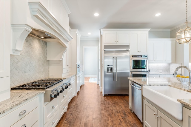 924 Winding Ridge Trl, Southlake, TX 76092 - kitchen with tasteful backsplash, stainless steel appliances, crown molding, and a sink