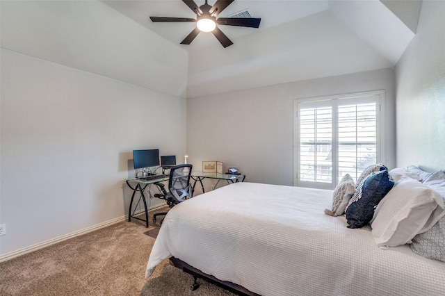 carpeted bedroom with baseboards, a ceiling fan, and vaulted ceiling
