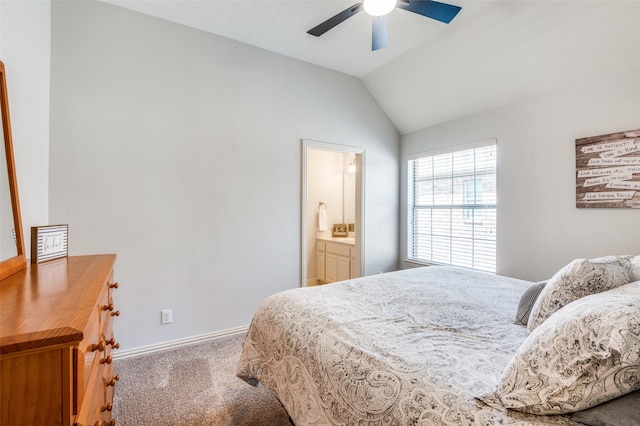 carpeted bedroom with ceiling fan, baseboards, and lofted ceiling