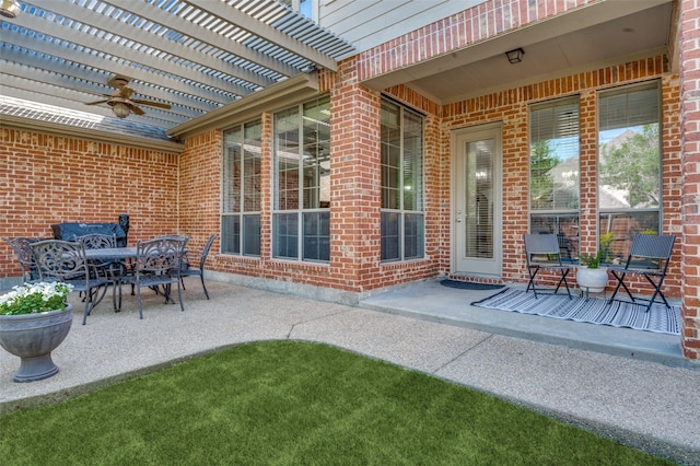 view of patio with a pergola and outdoor dining area