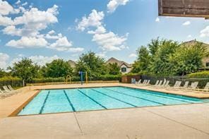 pool with a patio area