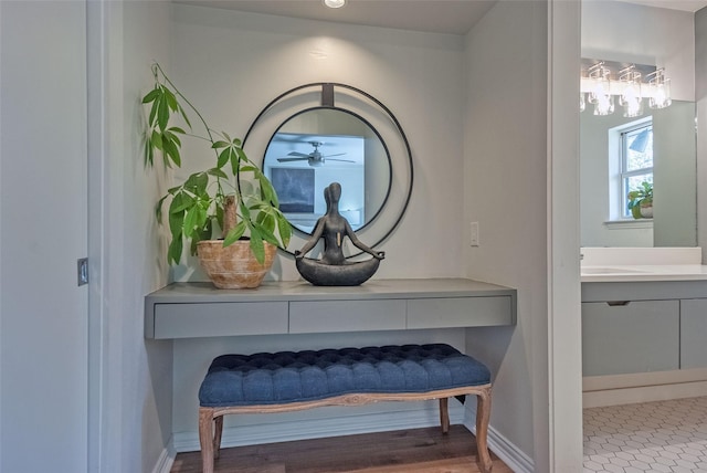 details with baseboards and ceiling fan