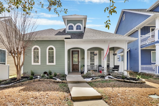1124 Spanish Moss Dr, Savannah, TX 76227 - view of front of house featuring a porch and a shingled roof