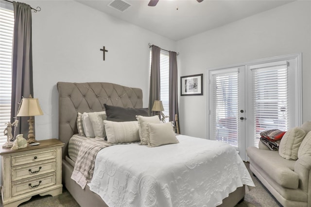 1124 Spanish Moss Dr, Savannah, TX 76227 - bedroom featuring ceiling fan, visible vents, access to exterior, french doors, and dark colored carpet