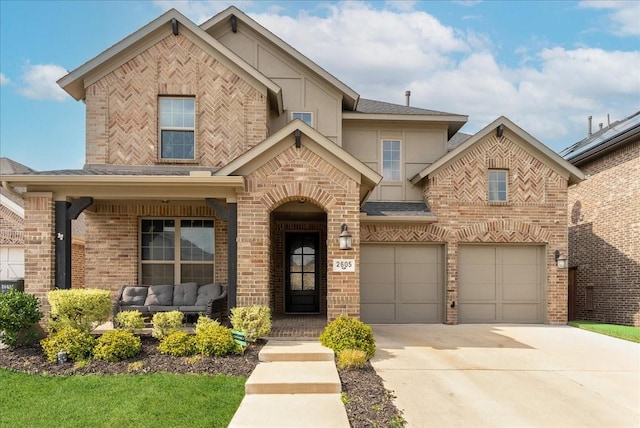 2605 High Bluff Dr, Mansfield, TX 76063 - view of front of property featuring roof with shingles, stucco siding, brick siding, an attached garage, and driveway
