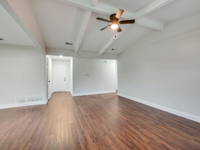 spare room with visible vents, baseboards, a ceiling fan, and dark wood-style floors
