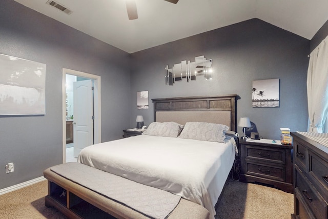 bedroom with baseboards, a ceiling fan, visible vents, lofted ceiling, and light colored carpet