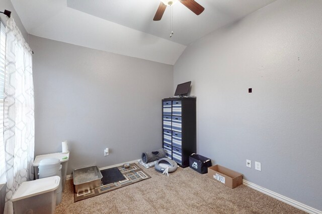 miscellaneous room with carpet flooring, baseboards, a ceiling fan, and lofted ceiling