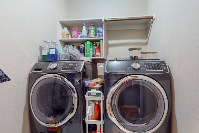 laundry area featuring laundry area and washing machine and clothes dryer