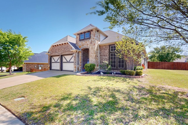 view of front facade with an attached garage, fence, concrete driveway, brick siding, and a front lawn