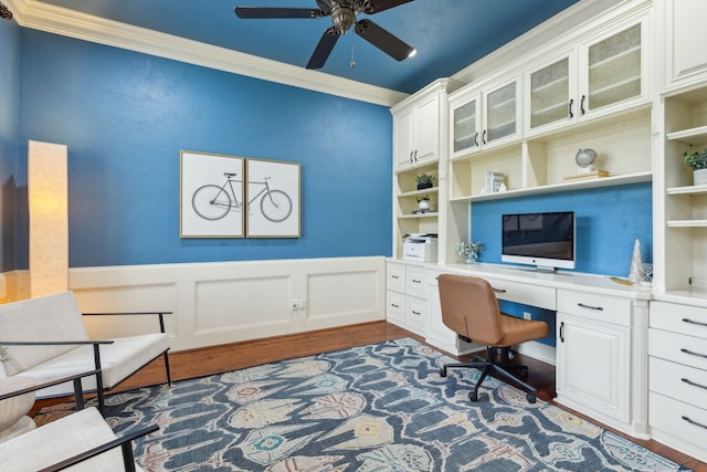3007 Sunray Valley Ct, Arlington, TX 76012 - office with built in desk, dark wood finished floors, ornamental molding, ceiling fan, and wainscoting