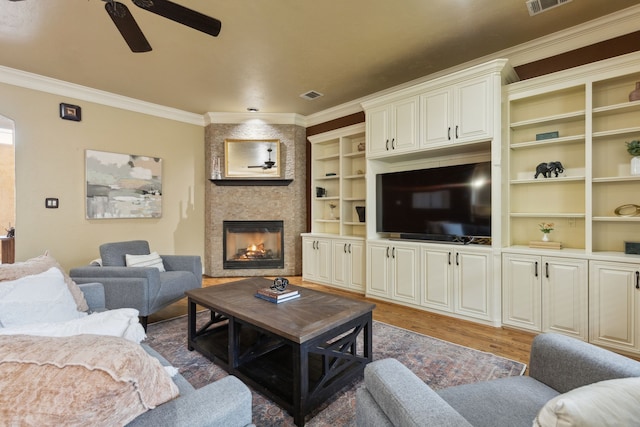 3007 Sunray Valley Ct, Arlington, TX 76012 - living area featuring ceiling fan, ornamental molding, wood finished floors, and a large fireplace