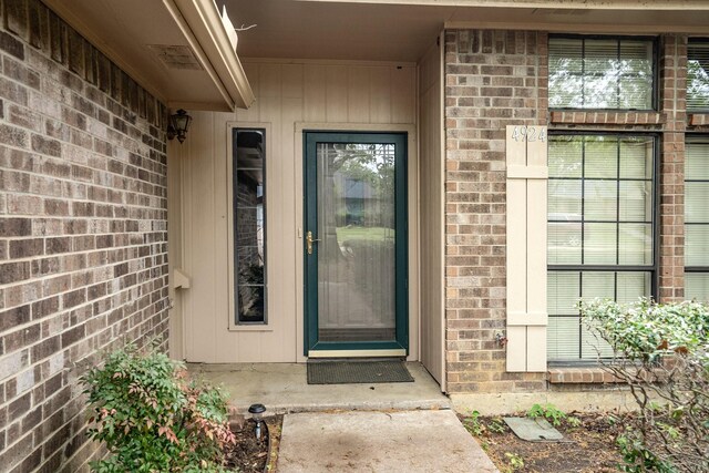 4924 Wolf Creek Trl, Flower Mound, TX 75028 - view of exterior entry featuring brick siding