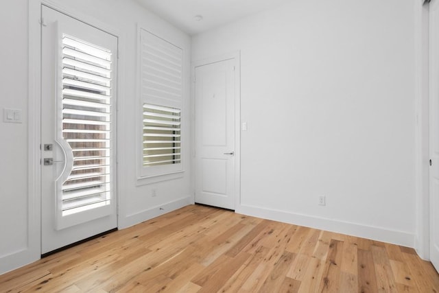 unfurnished bedroom featuring light wood finished floors