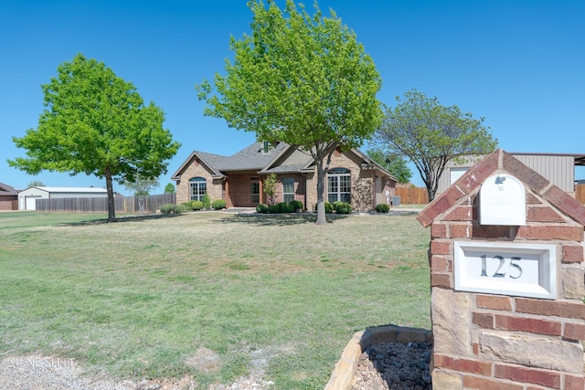 125 Mountain Meadow Dr, Tuscola, TX 79562 - view of front of home featuring a front yard and fence