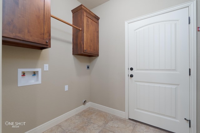 125 Mountain Meadow Dr, Tuscola, TX 79562 - clothes washing area featuring cabinet space, baseboards, hookup for an electric dryer, and washer hookup