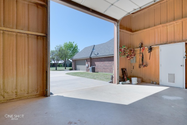 125 Mountain Meadow Dr, Tuscola, TX 79562 - garage with cooling unit and concrete driveway