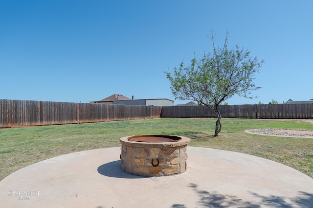 125 Mountain Meadow Dr, Tuscola, TX 79562 - view of patio / terrace with an outdoor fire pit and a fenced backyard