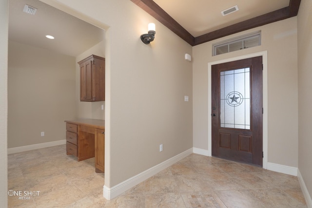125 Mountain Meadow Dr, Tuscola, TX 79562 - foyer with built in desk, visible vents, and baseboards