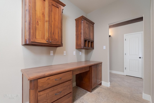 125 Mountain Meadow Dr, Tuscola, TX 79562 - unfurnished office with built in desk and baseboards