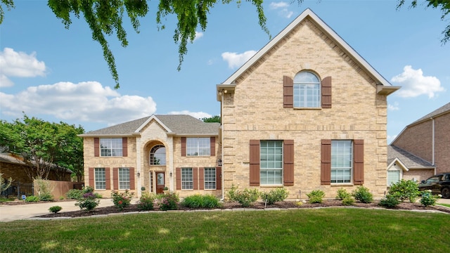 4921 Bob Wills Dr, Fort Worth, TX 76244 - view of front of home featuring brick siding and a front yard