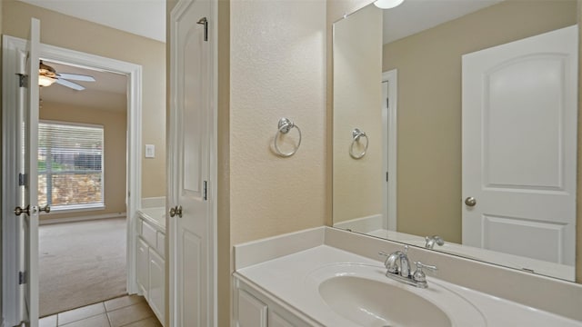 bathroom featuring vanity, a ceiling fan, and tile patterned floors