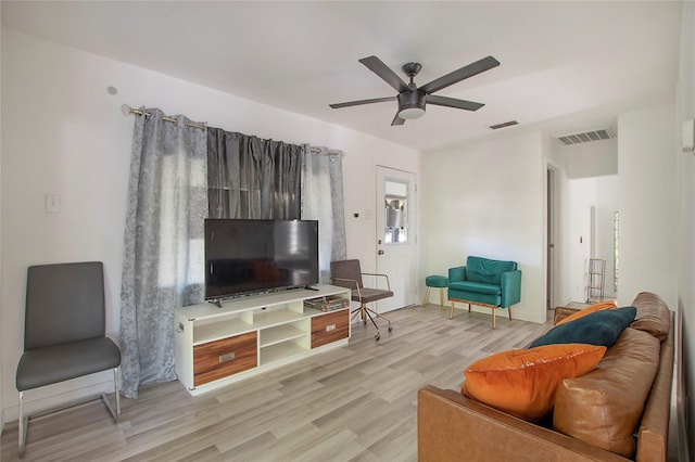 626 N Hampton Rd, Dallas, TX 75208 - living room with visible vents, a ceiling fan, and wood finished floors