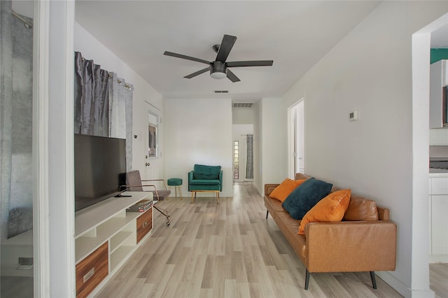 626 N Hampton Rd, Dallas, TX 75208 - living room with light wood-type flooring, a ceiling fan, and visible vents