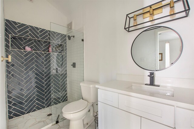 626 N Hampton Rd, Dallas, TX 75208 - full bath with vanity, marble finish floor, a tile shower, and toilet