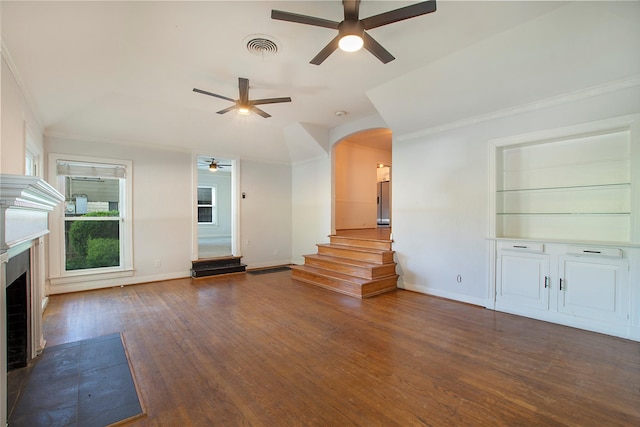 626 N Hampton Rd, Dallas, TX 75208 - unfurnished living room featuring hardwood / wood-style floors, visible vents, baseboards, and a ceiling fan