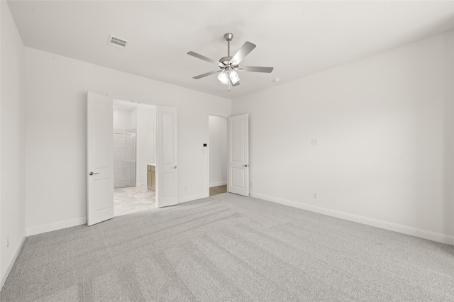 424 Lamb Ln, Waxahachie, TX 75167 - unfurnished bedroom with light colored carpet, visible vents, connected bathroom, and baseboards