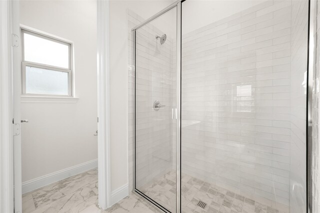 424 Lamb Ln, Waxahachie, TX 75167 - bathroom with baseboards, a stall shower, and marble finish floor