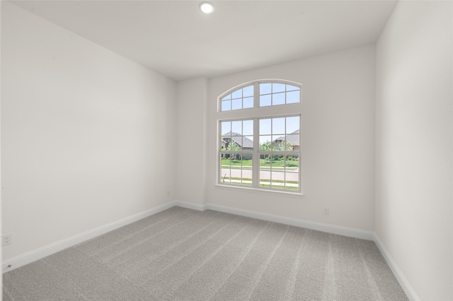 424 Lamb Ln, Waxahachie, TX 75167 - spare room with recessed lighting, light carpet, and baseboards