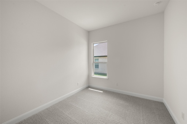 424 Lamb Ln, Waxahachie, TX 75167 - empty room with light carpet and baseboards