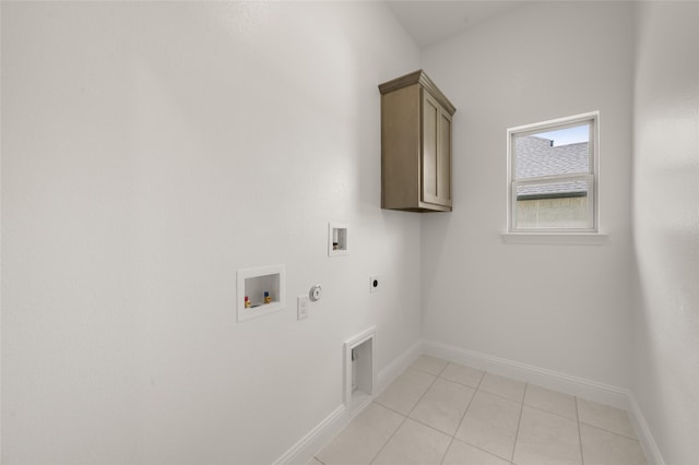 424 Lamb Ln, Waxahachie, TX 75167 - laundry area with hookup for an electric dryer, hookup for a gas dryer, baseboards, hookup for a washing machine, and cabinet space
