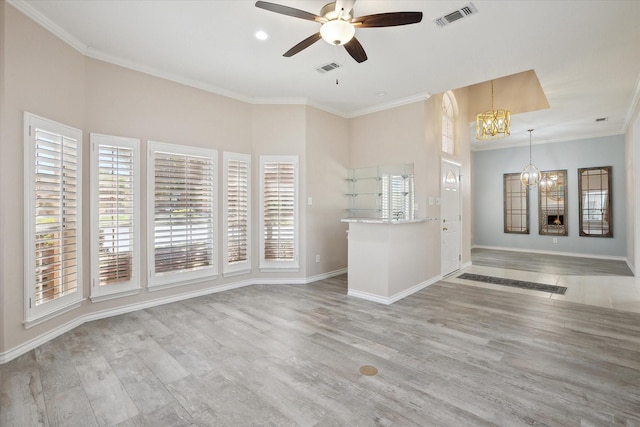 8508 Landing Way Ct, Fort Worth, TX 76179 - unfurnished living room featuring a chandelier, ceiling fan, crown molding, wood finished floors, and baseboards