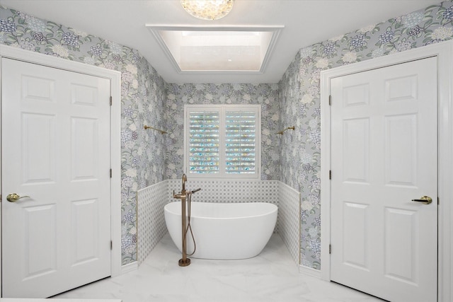 8508 Landing Way Ct, Fort Worth, TX 76179 - full bathroom featuring wallpapered walls, a soaking tub, and marble finish flooring