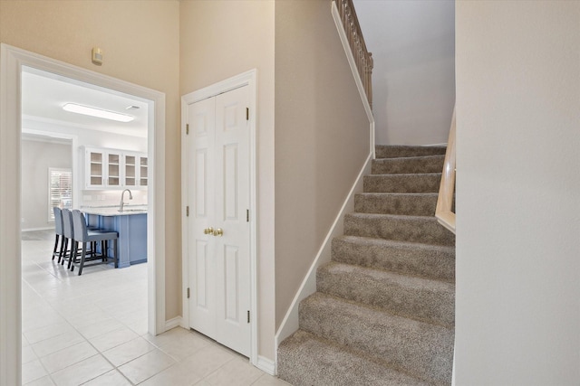 8508 Landing Way Ct, Fort Worth, TX 76179 - stairway featuring tile patterned flooring and baseboards
