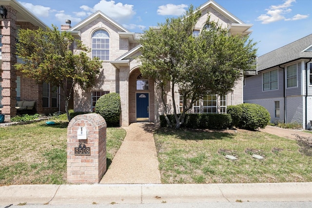8508 Landing Way Ct, Fort Worth, TX 76179 - traditional-style home with a front lawn and brick siding