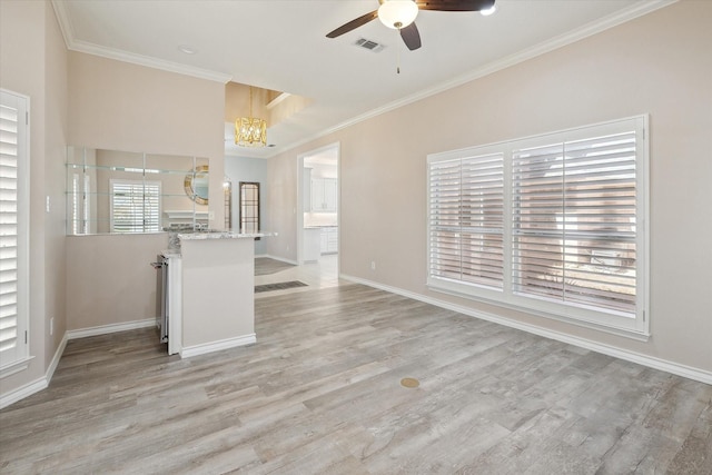 8508 Landing Way Ct, Fort Worth, TX 76179 - unfurnished living room with a chandelier, ceiling fan, ornamental molding, baseboards, and light wood-style flooring