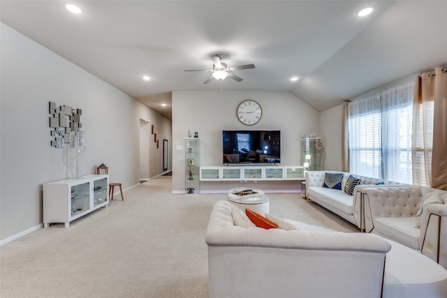 carpeted living area with ceiling fan, recessed lighting, baseboards, and lofted ceiling