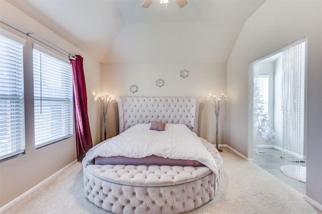 bedroom featuring baseboards, a ceiling fan, vaulted ceiling, and carpet floors