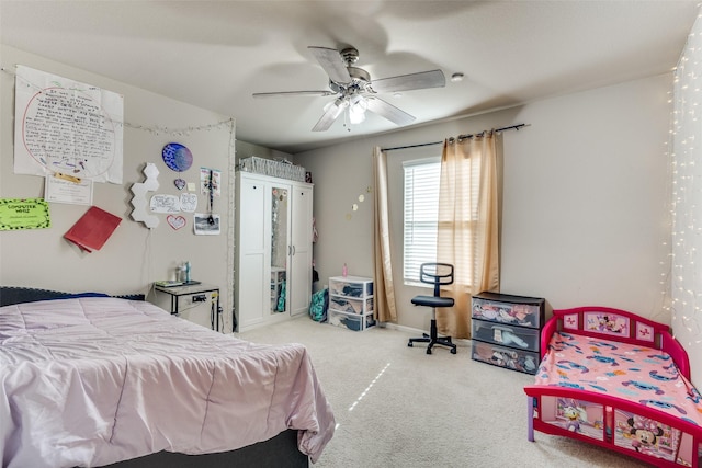 bedroom with ceiling fan and carpet