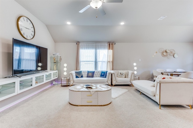 living area with visible vents, ceiling fan, carpet floors, recessed lighting, and vaulted ceiling